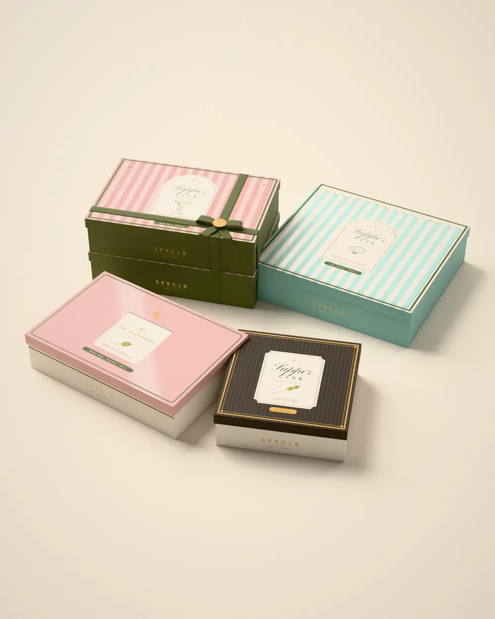 Four SPRCLB boxes stacked and tied, from For 2 to For 8: Date Night, The Sleepover, Spa Night and The Original